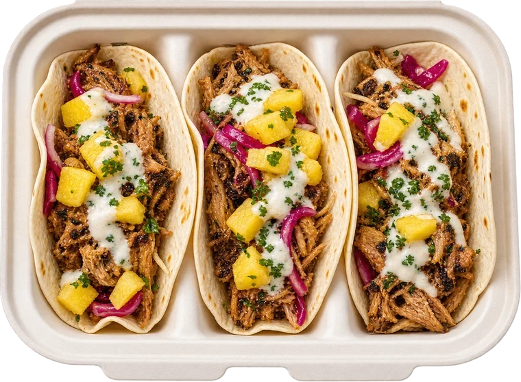 Three Caribbean Chicken tacos in a Lime&nbsp;Out container